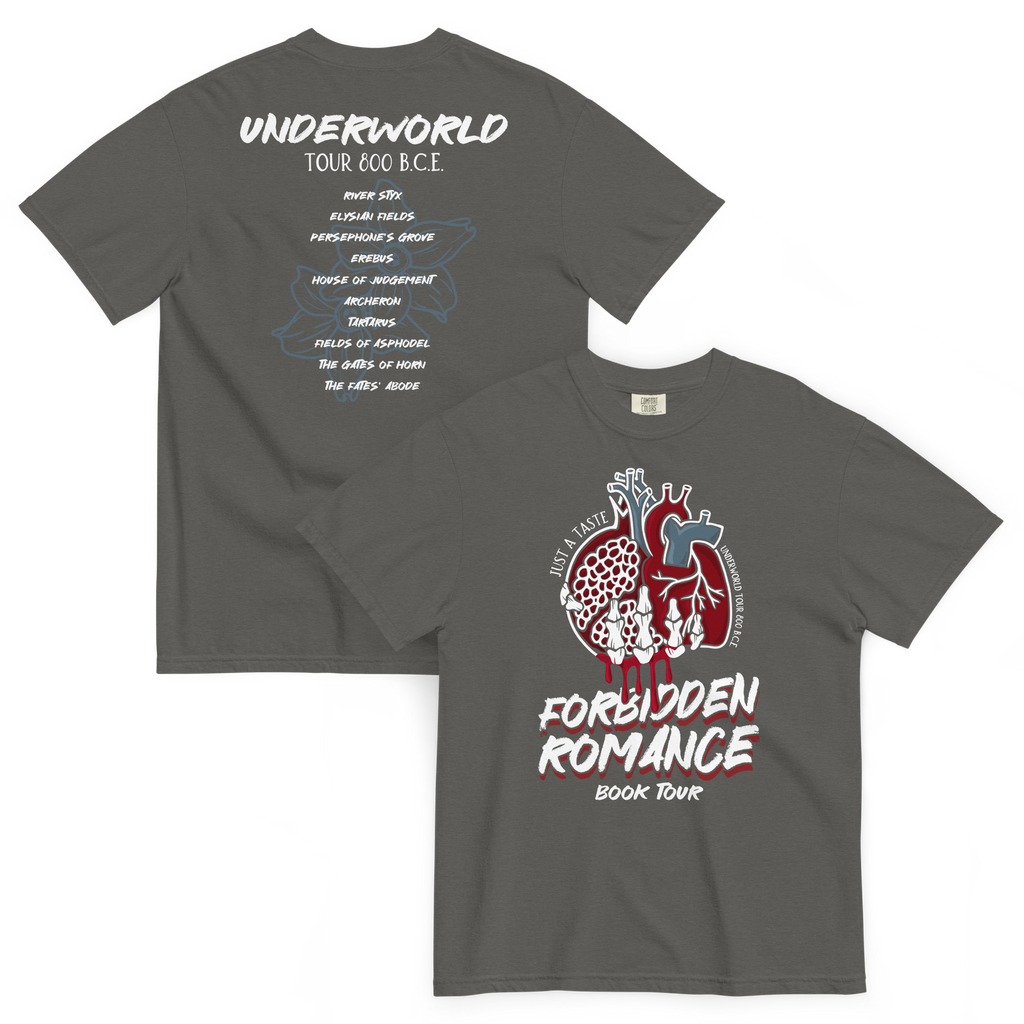 Front and back mockup of a charcoal gray t-shirt with a graphic design of an anatomical heart and pomegranate being held by a skeleton hand on the front with the words 'FORBIDDEN ROMANCE BOOK TOUR'. The back features a concert style tee with the text 'UNDERWORLD TOUR 800 B.C.E' with several underworld locations and narcissus flowers in the background.