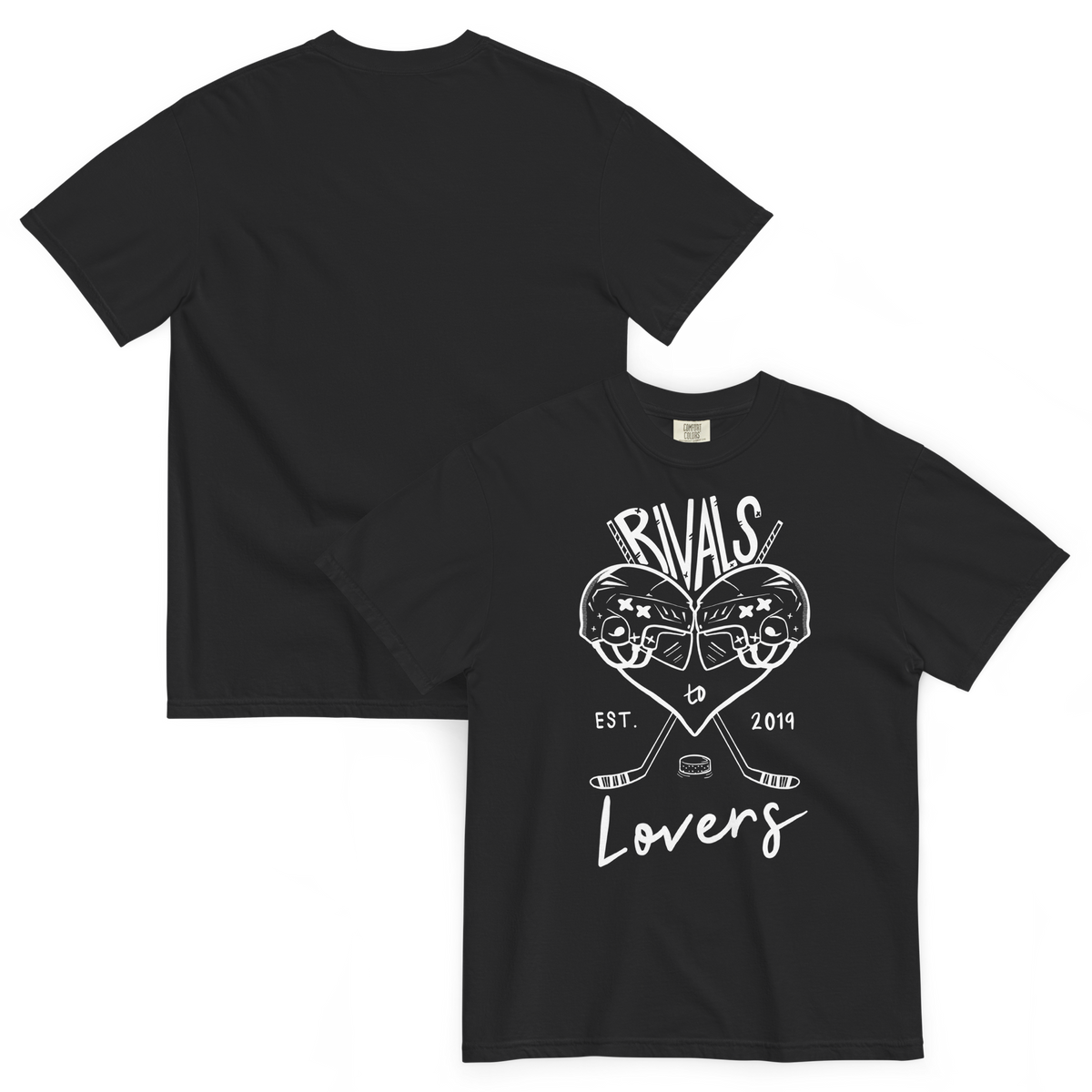 A mockup front and back of a black short-sleeve t-shirt laid flat on a white surface, featuring a white graphic print of two hockey helmets forming a heart, crossed hockey sticks, a hockey puck, and the text 'RIVALS to Lovers EST. 2019' on the front with a blank back.